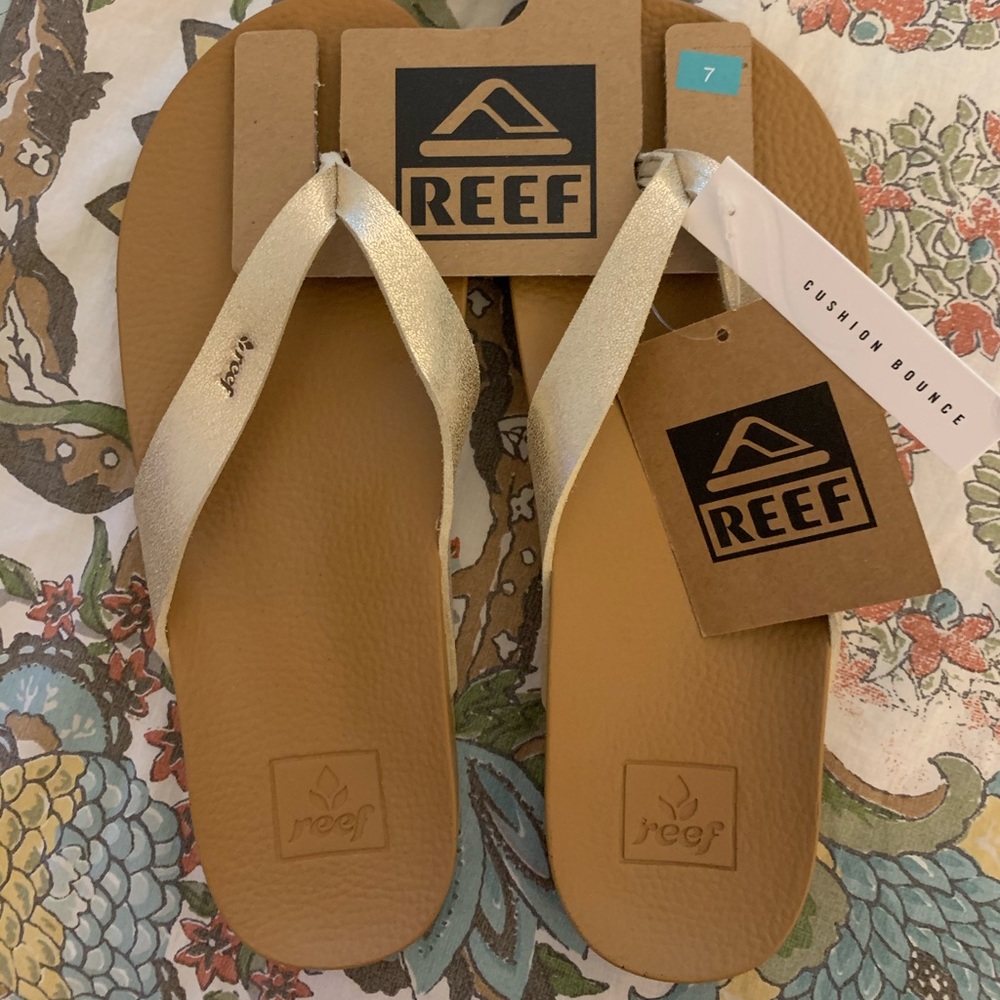 Reef women’s gold flip flops